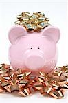 Pink Piggy Bank on isoalted on white background with christmas bows