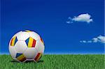 Romanian soccer ball laying on the grass