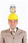confused a businessman clock alarm on his head
