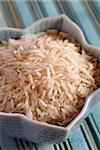 macro picture of a lotus shaped bowl filled with basmati rice