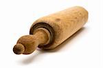 Old and used rolling pin. White background. Shallow depth of field.