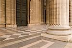 Classical antic columns at the front of the pantheon in Paris