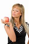 nice blond girl with a red apple in her hand and a black and white checked dress