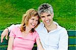 Portrait of mature romantic couple on a bench