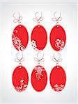price tags with floral elements, red