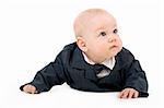 Toddler boy in a suit crawling on isolated background