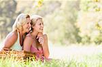 Mother with adult daughter on picnic