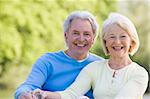 Couple outdoors smiling