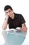 Portrait of a young man studying with a positive expression.