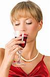 nice portrait of a cute girl with pearl necklace drinking a glass of wine