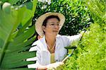 Portrait of senior Italian woman gardening