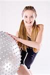 Smiling pretty young girl on white background