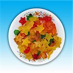 A plate of star and bear shaped jelly candies. Including clipping path.