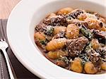 Oxtail Braised in Red Wine with Basil Gnocchi and Parmesan Chees