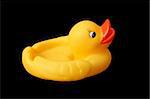 rubber duck isolated on black