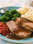 Mama's Meatloaf with Mashed Potato Broccoli Tomatoes and Gravy