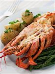 Half a Lobster Thermidor with New Potatoes and Asparagus Spears