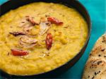 Bowl of Tarka Dal with side of Naan Bread