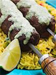 Plate of Lamb Mint and Garlic Sheesh Kebab with Pilau Rice and Raita