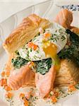 Seared Salmon Spinach and a Poached Egg in a Vol au Vent Case wi