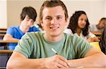 Male college student in a university lecture hall