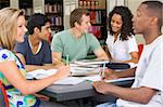 College students studying together in a library