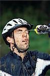 Mountain biker refreshing