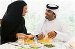 A Middle Eastern couple enjoying a meal