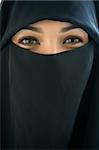 Portrait of a middle eastern woman wearing a black hijab