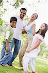 Family having fun in park together