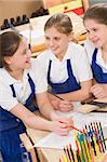 Schoolgirls in woodwork class