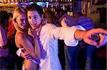 Young couple having fun at a nightclub