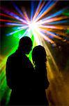 Romantic Dancer at the disco night club meeting Light rays
