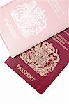 his and her style british passports on white