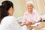 Woman in doctor's office smiling