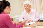 Woman in doctor's office frowning