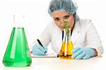 Scientist, botanist, studying a plant in laboratory.
