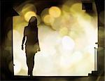 Illustration of a woman's silhouette with blurred lights behind