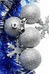 Silver Christmas bulbs with snowflakes and blue tinsel