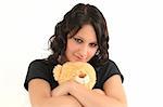 Young, cute teenage girl with teddy