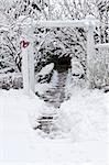 Path leading to a house after heavy snowfall