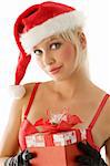 close up of a young blond beautiful santa claus with christmas gift box