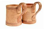 wooden mugs for beer on white background