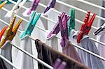 Clothline with clothespins and drying clothes