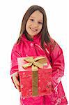 Young girl in a pink raincoat giving a present to the camera