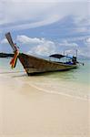 Longtail boat in bright blue water, Koh Poda, Krabi Province, Thailand