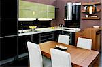 Contemporary kitchen with brown dinning table and chairs