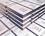 stacks of pure platinum bars on piles of bullion