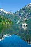 Boat in the ocean, Geiranger fjord, Norway view to the nature