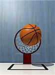 Basketball in air over hoop - rendered in 3d